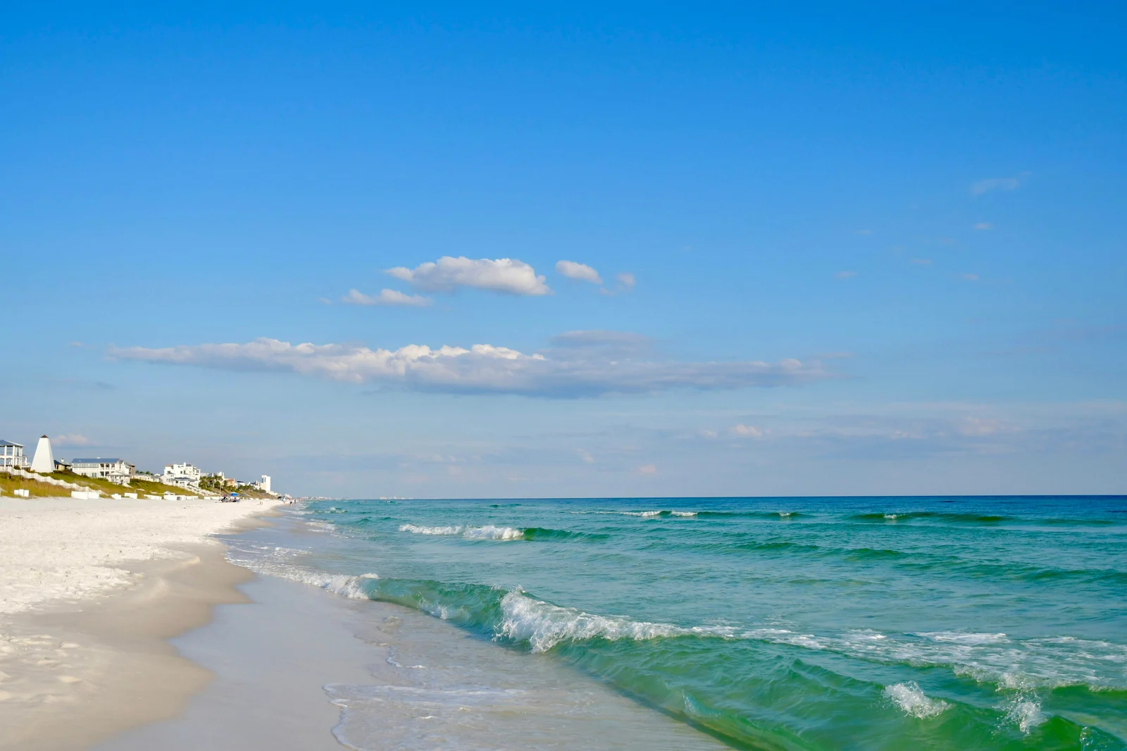 White sand beach and turquoise Gulf water on the Emerald Coast in fall