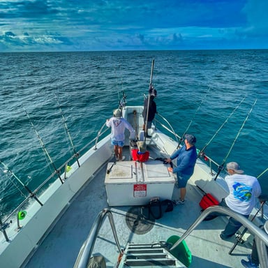 Anglers on a charter boat heading offshore on the Gulf