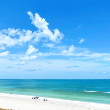 Aerial view of Perdido Key's white sand beach and emerald Gulf water