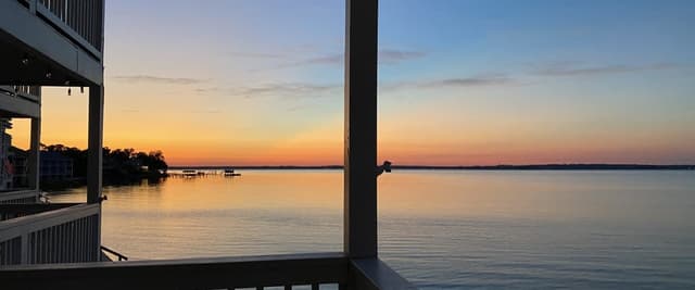 Gulf Coast sunset from a waterfront deck on Perdido Key